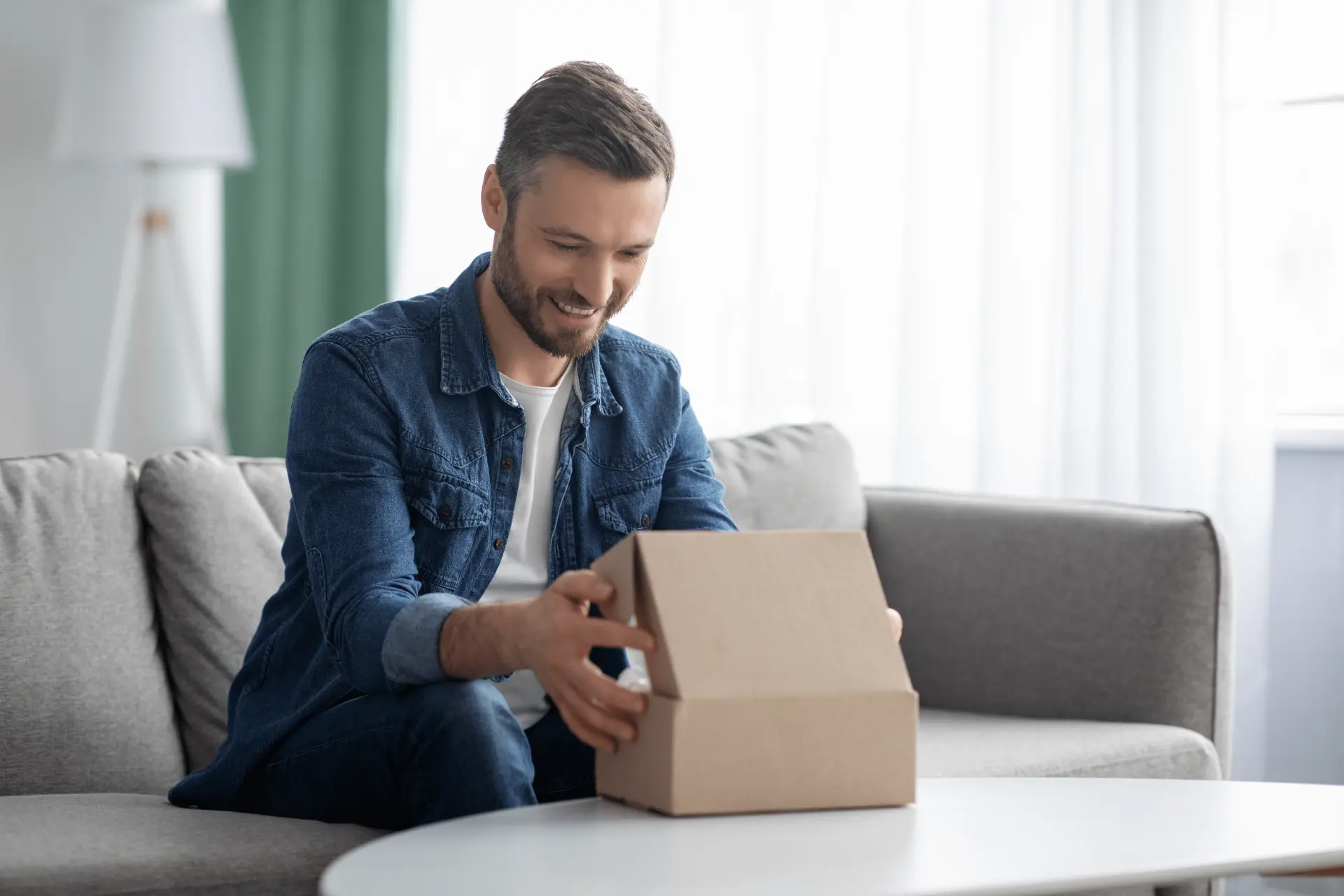Plain discreet shipping box opened at home
